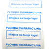 z_usl_nad_plom_ Plomby gwarancyjne kruche białe 30x11 nadruk NIEBIESKI
