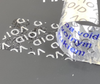 z_usl_nad_p 45x18 mm plomby gwarancyjne VOID SREBRNE nadruk NIEBIESKI 100 szt.