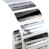 z_usl_nad_p 30x11 mm plomby gwarancyjne VOID SREBRNE nadruk CZARNY 100 szt.