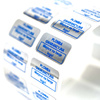 z_usl_nad_ 20x10 mm plomby gwarancyjne VOID SREBRNE nadruk NIEBIESKI 100 szt.